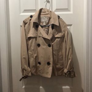 Trendy waist high trench coat